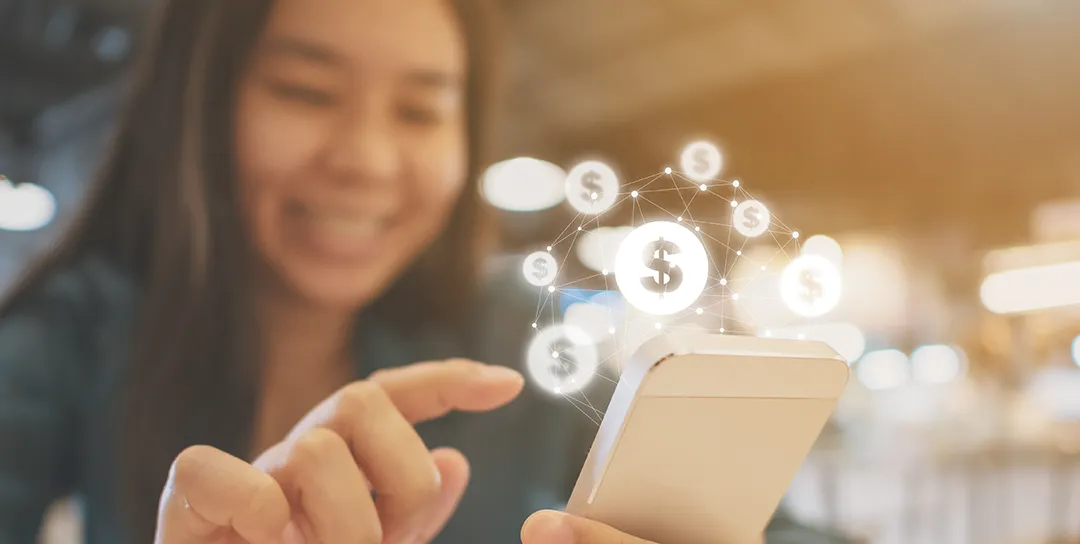 Girl calculating money balance on her phone.