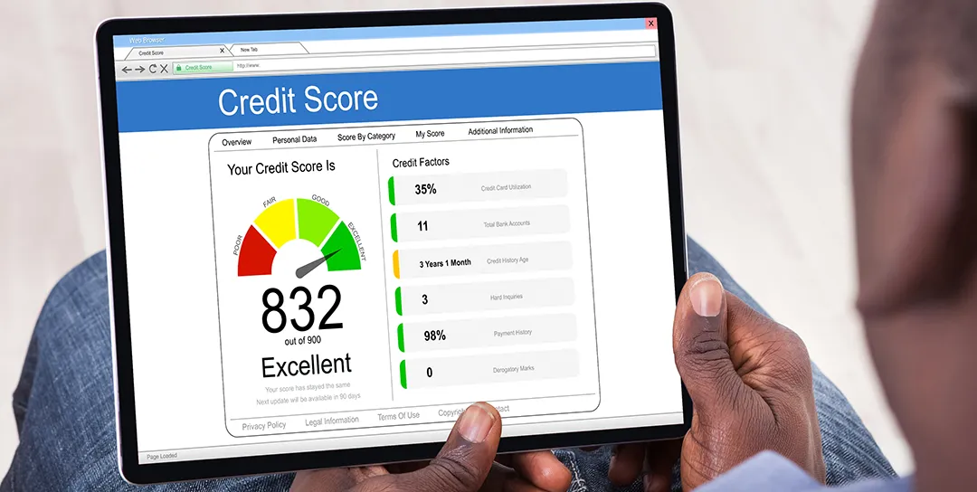 Tablet with credit score graph on it.
