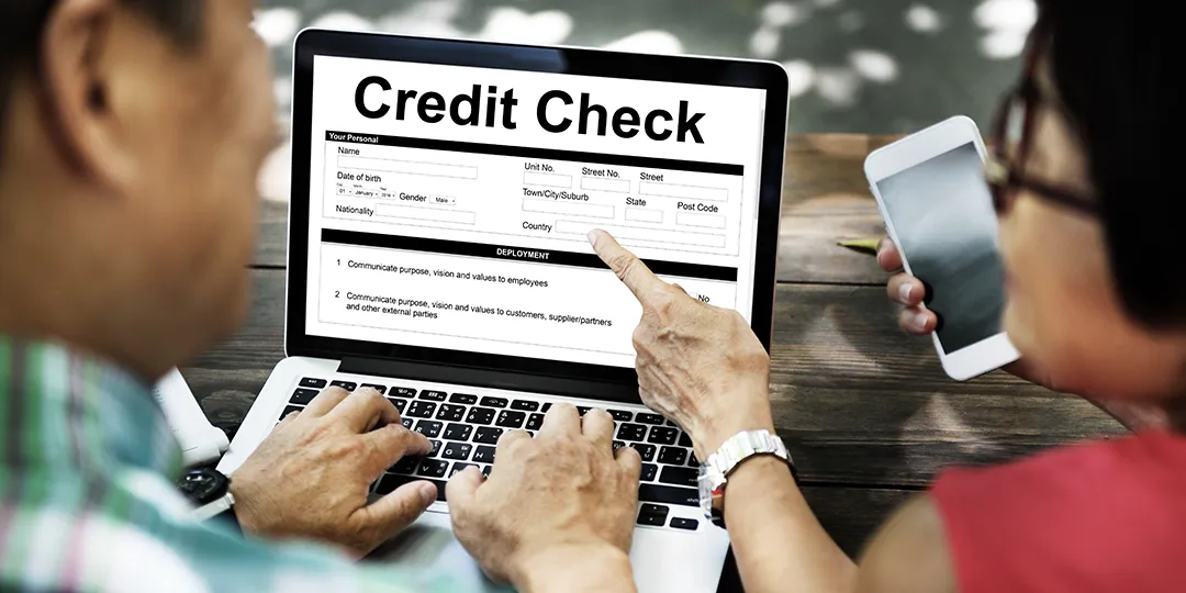 Couple checking their credit.